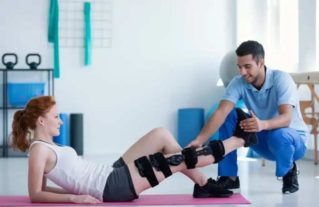Debunking Meal Timing Myths: The Truth About Muscle Recovery 1 Woman having treatment to help muscle recovery Gloucestershire after an injury